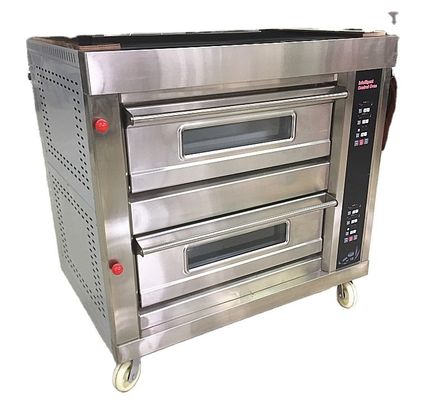 Ronde kokosbrood bakken makkelijk gemaakt met grote dekoven machine bij Pie Long Loaf Bakery